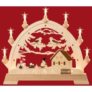 Taulin round arch house with snowman