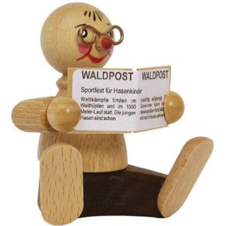 Wagner gnome with newspaper sitting
